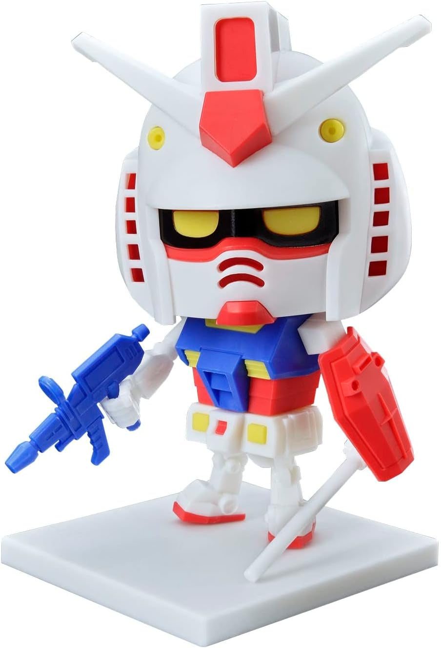 Colorful robot figurine with a white helmet, red and blue body, and yellow eyes on a white background.