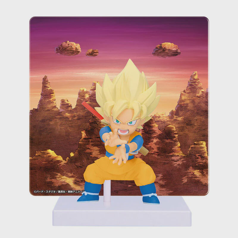 Super Saiyan character figurine with a desert landscape background
