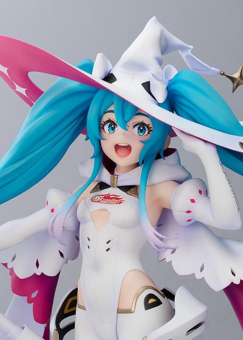 Anime character figurine with blue hair and white outfit on a gray background