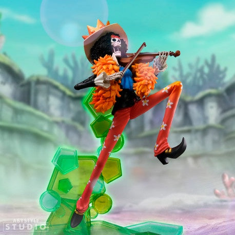 Animated character playing a violin on a colorful platform with a blurred background