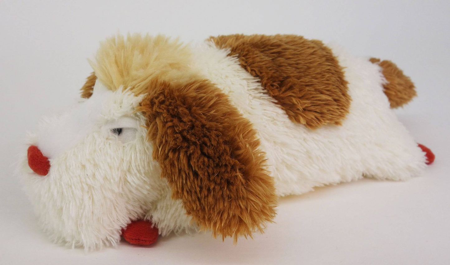 Plush toy dog with brown and white pattern on a light gray background