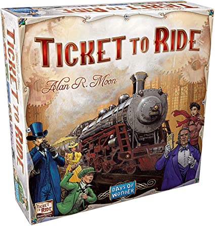 The image shows the board game 'Ticket to Ride' with its packaging. The game's box features a vintage steam train and several characters in Victorian-era clothing, indicating the game's theme and design.