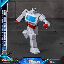 Transformers toy figure on a dark surface with branding and text around it