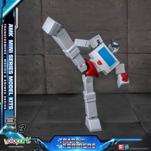 Model kit of a robot with AMK Mini Series branding on a dark background