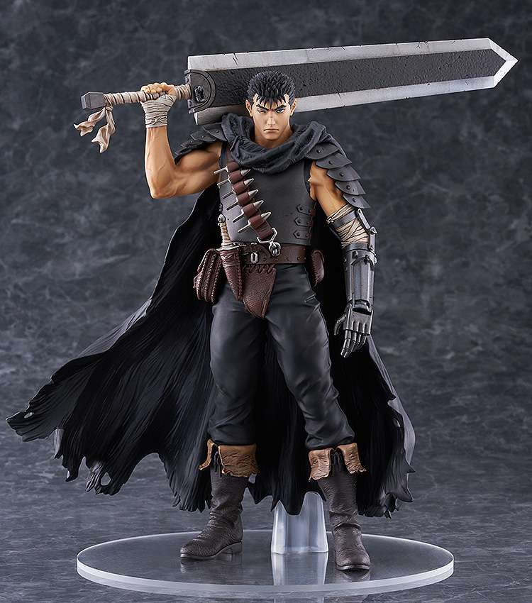 Action figure of a warrior with a large sword on a dark background