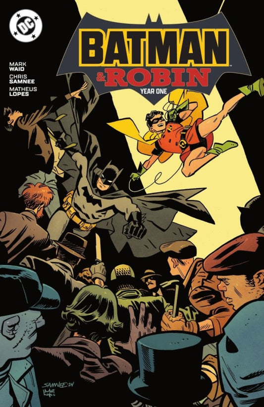 Comic book cover featuring Batman and Robin with a dynamic scene.