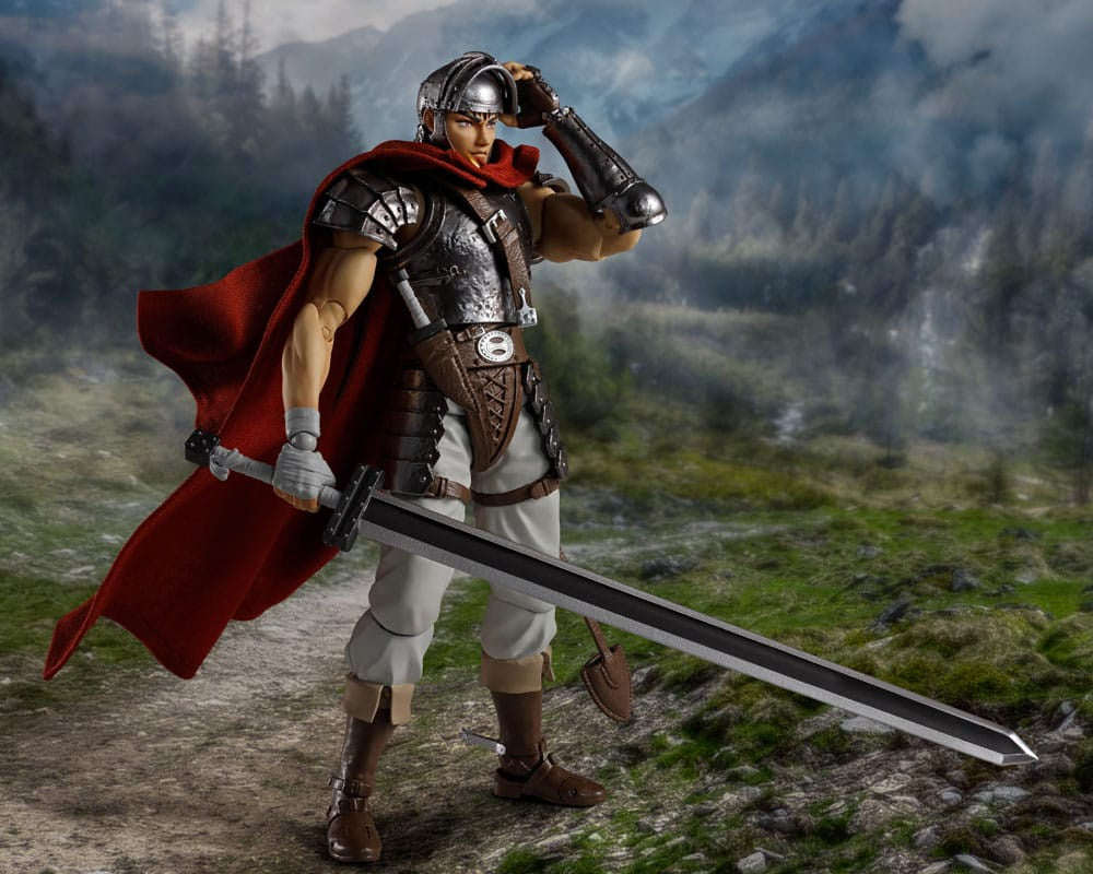 Figure of a warrior in armor with a red cape and sword in a mountainous landscape