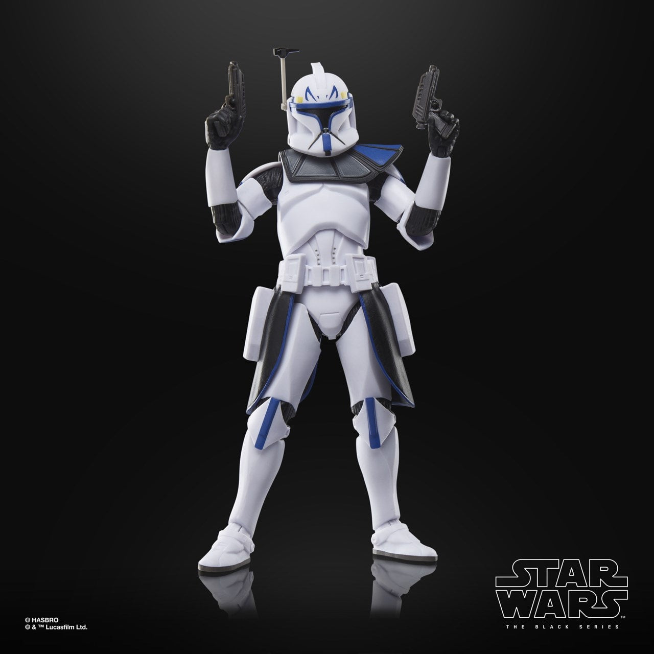 Star Wars action figure in white and blue costume on a black background