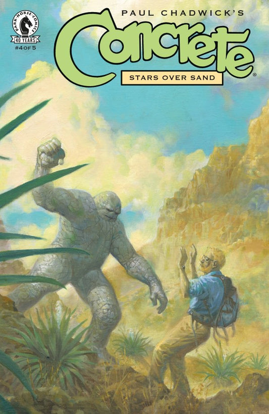 Comic book cover featuring a creature and a person in a desert landscape with 'Concrete' title and artist's name.