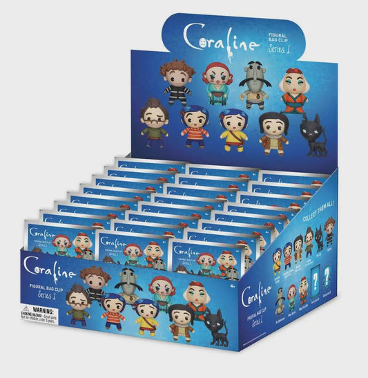 Display box of 'Coraline' themed figurine bag clips with character illustrations on a white background.