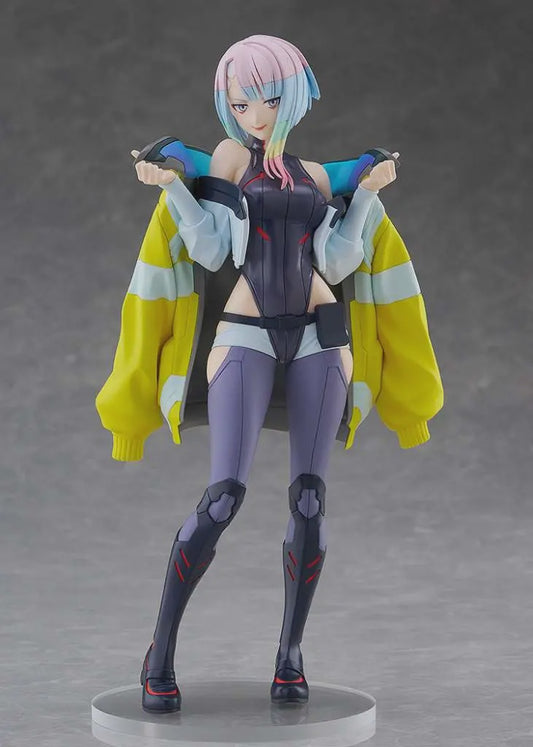 Action figure with colorful hair and futuristic outfit on a gray background