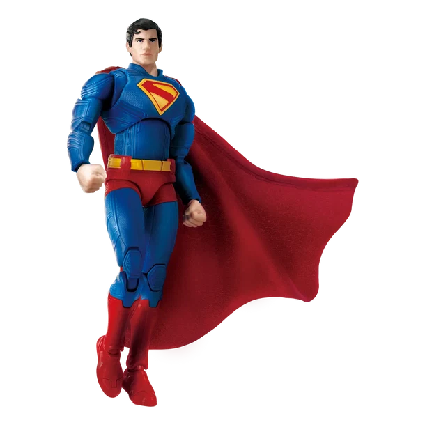 Superman action figure in a flying pose, wearing a blue suit with a red cape and red belt, isolated on a white background.