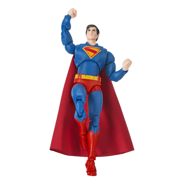 Superman action figure in a dynamic flying pose, featuring a blue bodysuit, red cape, red boots, and a yellow chest emblem on a plain white background.