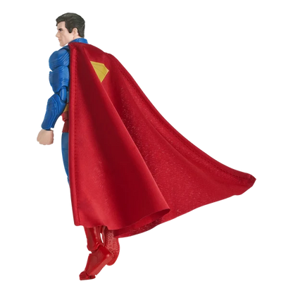 Superman action figure shown from the back and side, wearing a blue suit with a large red cape and yellow chest emblem, isolated on a white background.