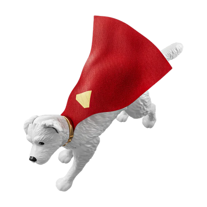 A small white dog figurine wearing a red cape with a yellow shield emblem and a gold collar, shown on a plain white background.