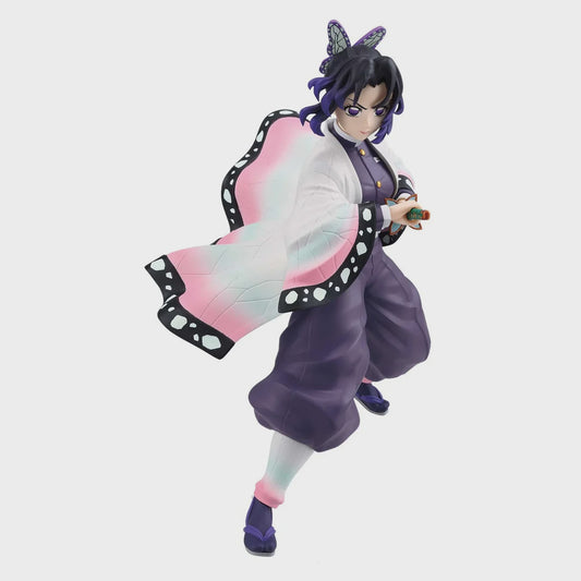 Anime character figurine in a dynamic pose on a light gray background