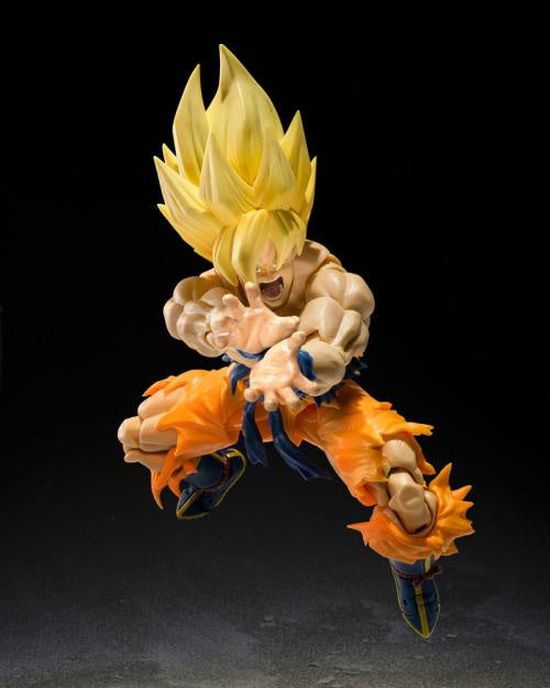 Super Saiyan character figurine in dynamic pose on a black background