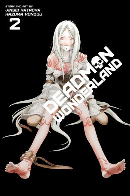 Manga book cover of 'Deadman Wonderland' with a character sitting on a black background