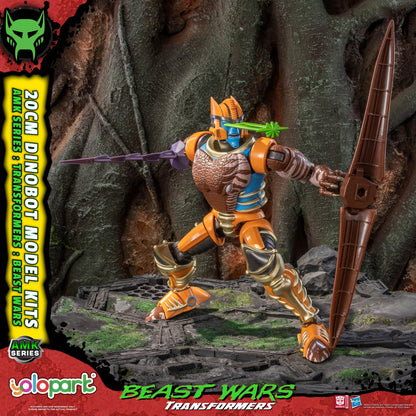 Toy figure of a dinosaur-like creature with a bow and arrow, set against a rocky background. Brand 'AMK' and 'yolopart' visible.