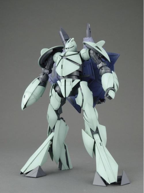 A detailed plastic model of a mecha robot, featuring a pale mint green and dark blue color scheme with gray accents, standing on a neutral gray background.