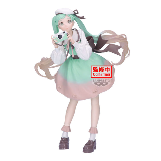 Figurine of an animated character with green hair and a white outfit, holding a small white creature, on a white background.