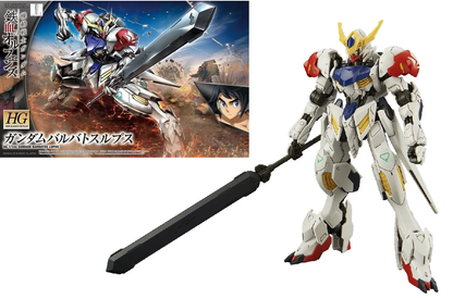 Model kit of a robot with a sword next to its packaging