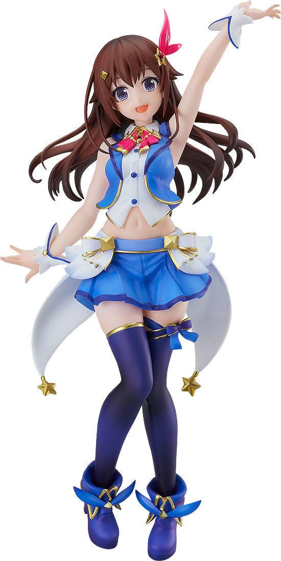 Figurine of a character in a blue and white outfit with a pink hair accessory on a white background