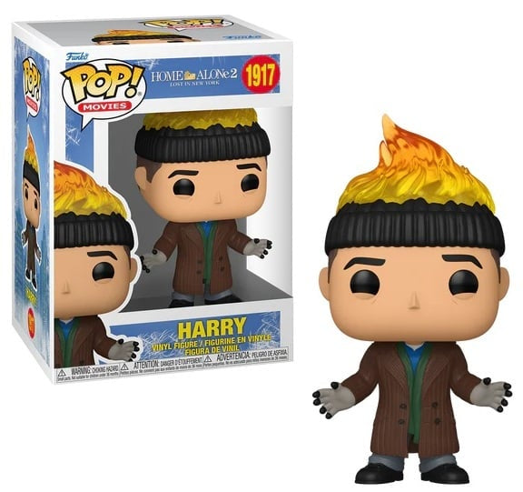 Funko Pop! vinyl figure of a character with flaming hair from 'Home Alone 2' next to its packaging.