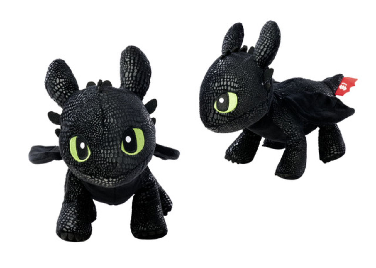 Two black plush toys with green eyes on a white background