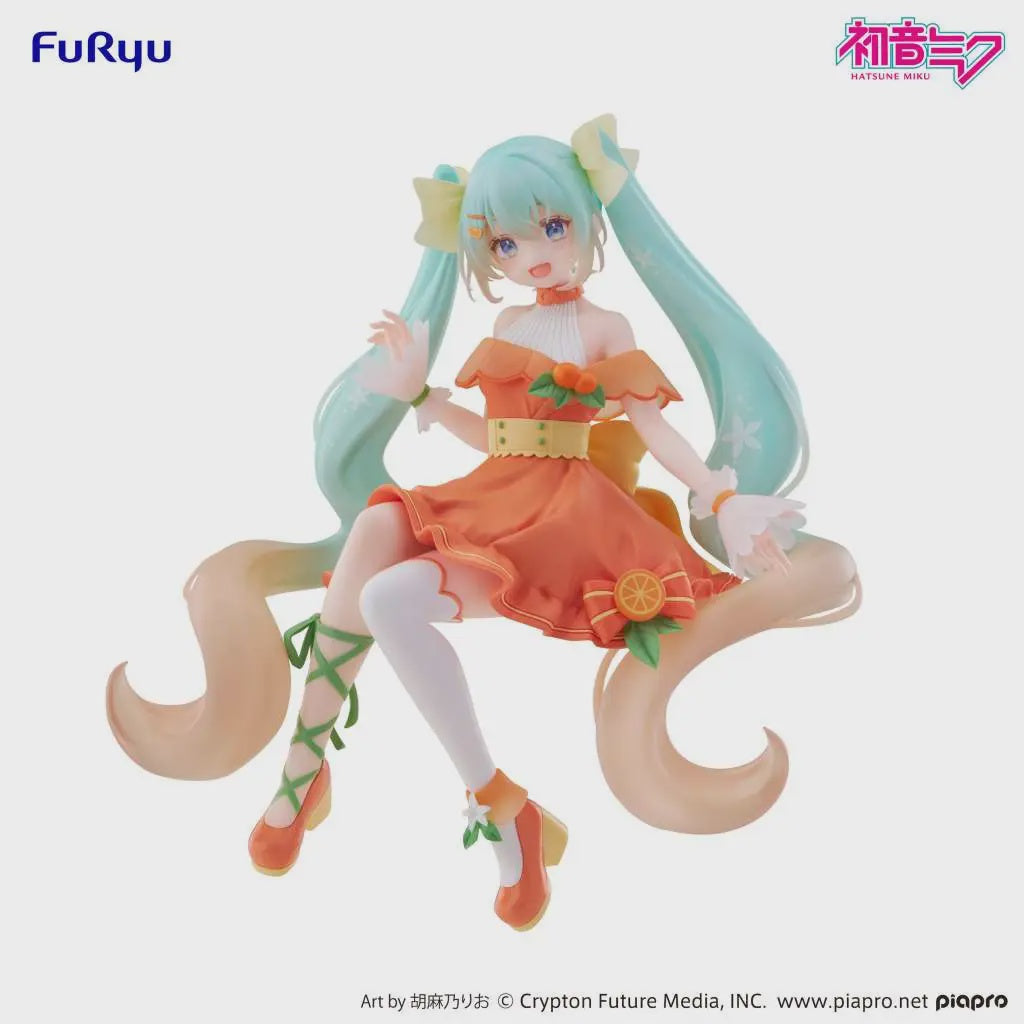 A stylized anime figurine of Hatsune Miku in a spring-themed outfit, posed dynamically against a plain white background. The figure has long mint green twin-tails, a peach and orange dress with green leaf accents, white thigh-high stockings, and orange shoes.