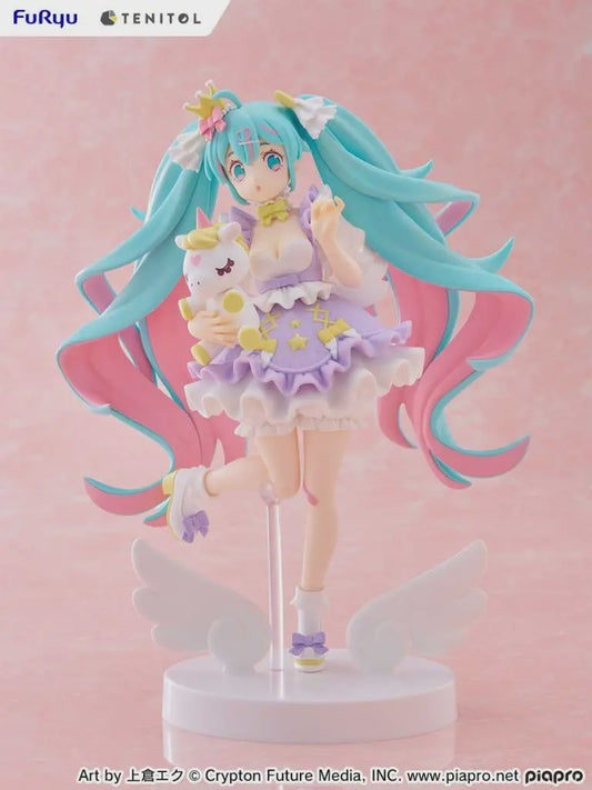 Figurine of a character with teal hair and a unicorn on a pink background, featuring the brand 'Furuju'.