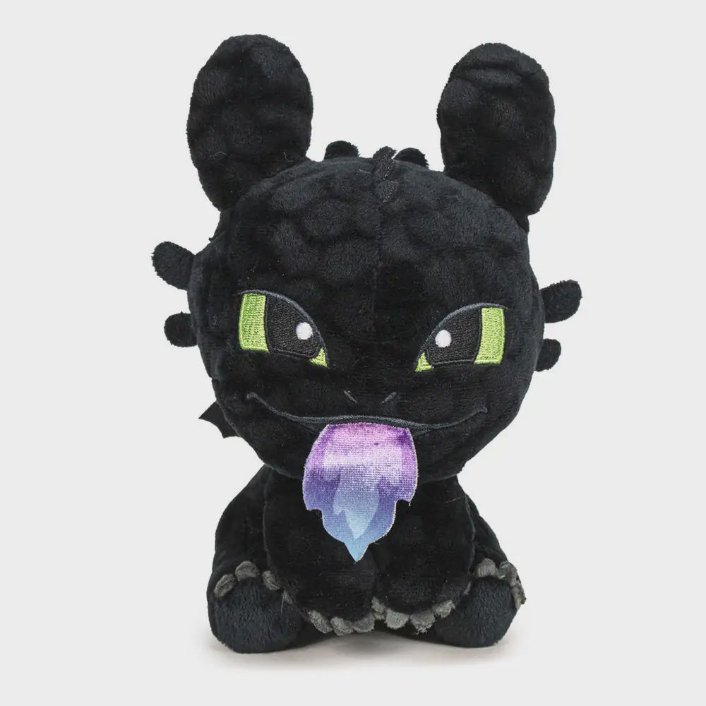 Black plush toy with purple and blue accents on a white background
