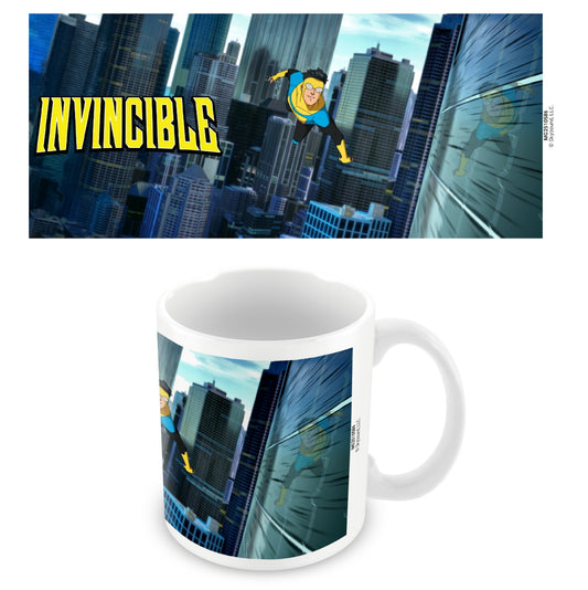 Mug with superhero design and 'Invincible' text against a cityscape background