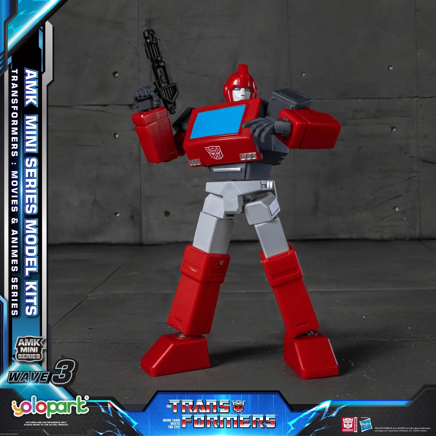Red and gray robot toy figure with AMK Mini Series Model Kits branding on a dark background