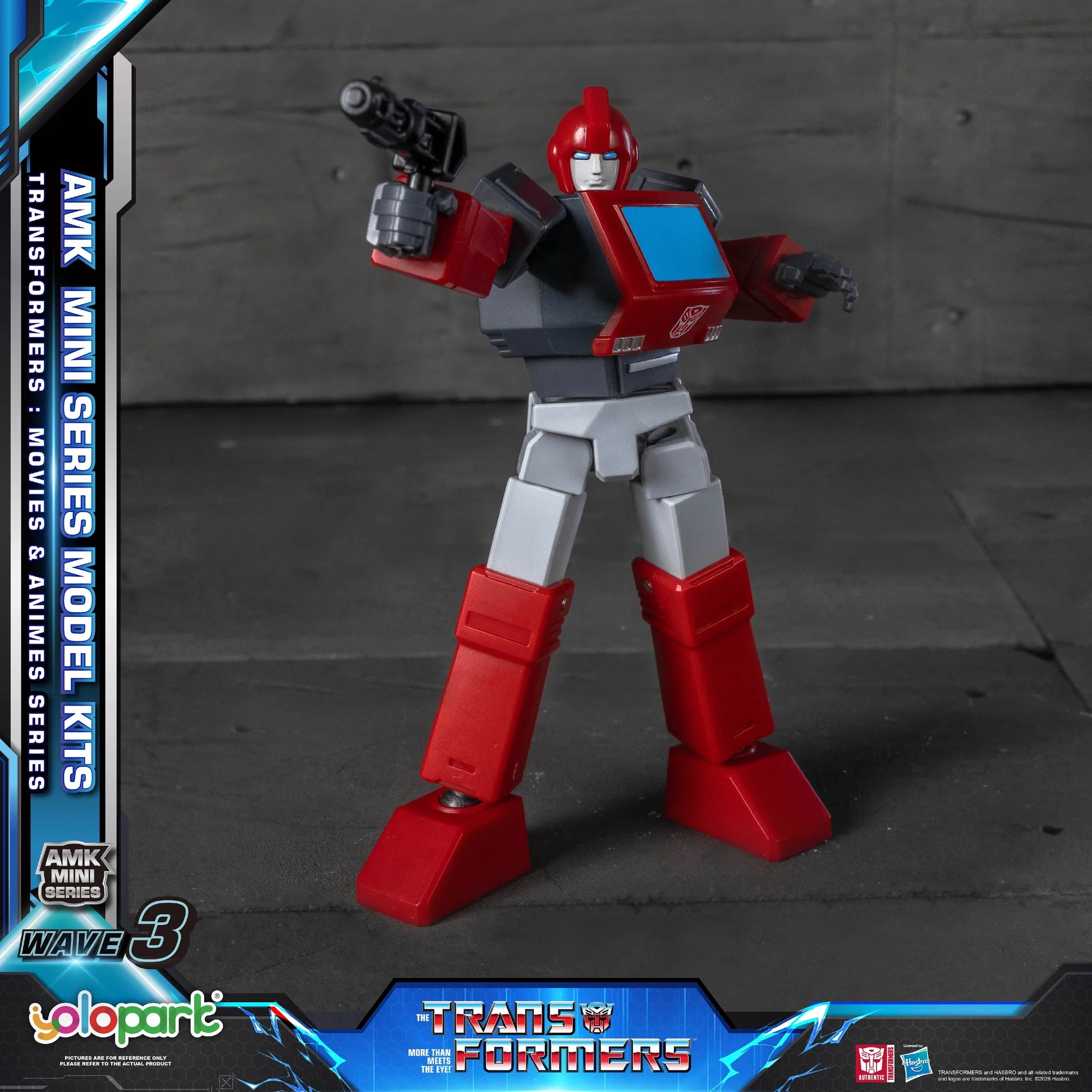 Transformers model kit with red and gray coloring on a dark background
