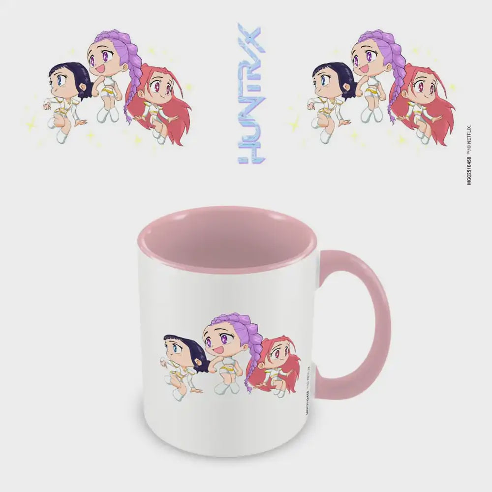 Mug with cartoon characters and 'Huntrix' branding on a light gray background