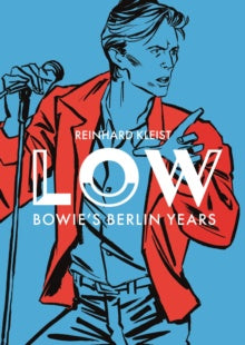 A man with a red jacked grabbing a microphone on a blue background