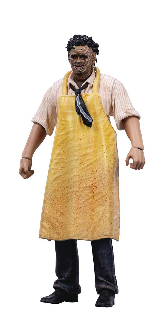 Action figure wearing a yellow apron and black shoes on a white background