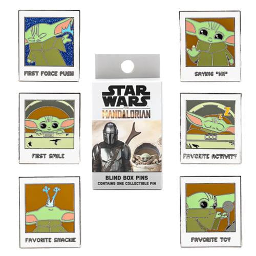 Set of 'Star Wars' themed collectible pins featuring Baby Yoda with packaging.