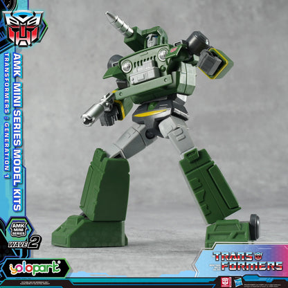 Transformers model kit with branding and product details on a gray background