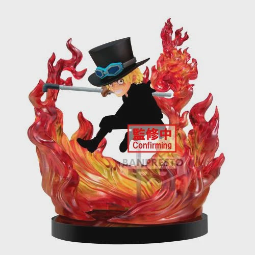 A figurine of Sabo from the anime One Piece, depicted with a black coat, white shirt, and a black hat with a blue feather, holding a staff, and surrounded by fiery red accents.