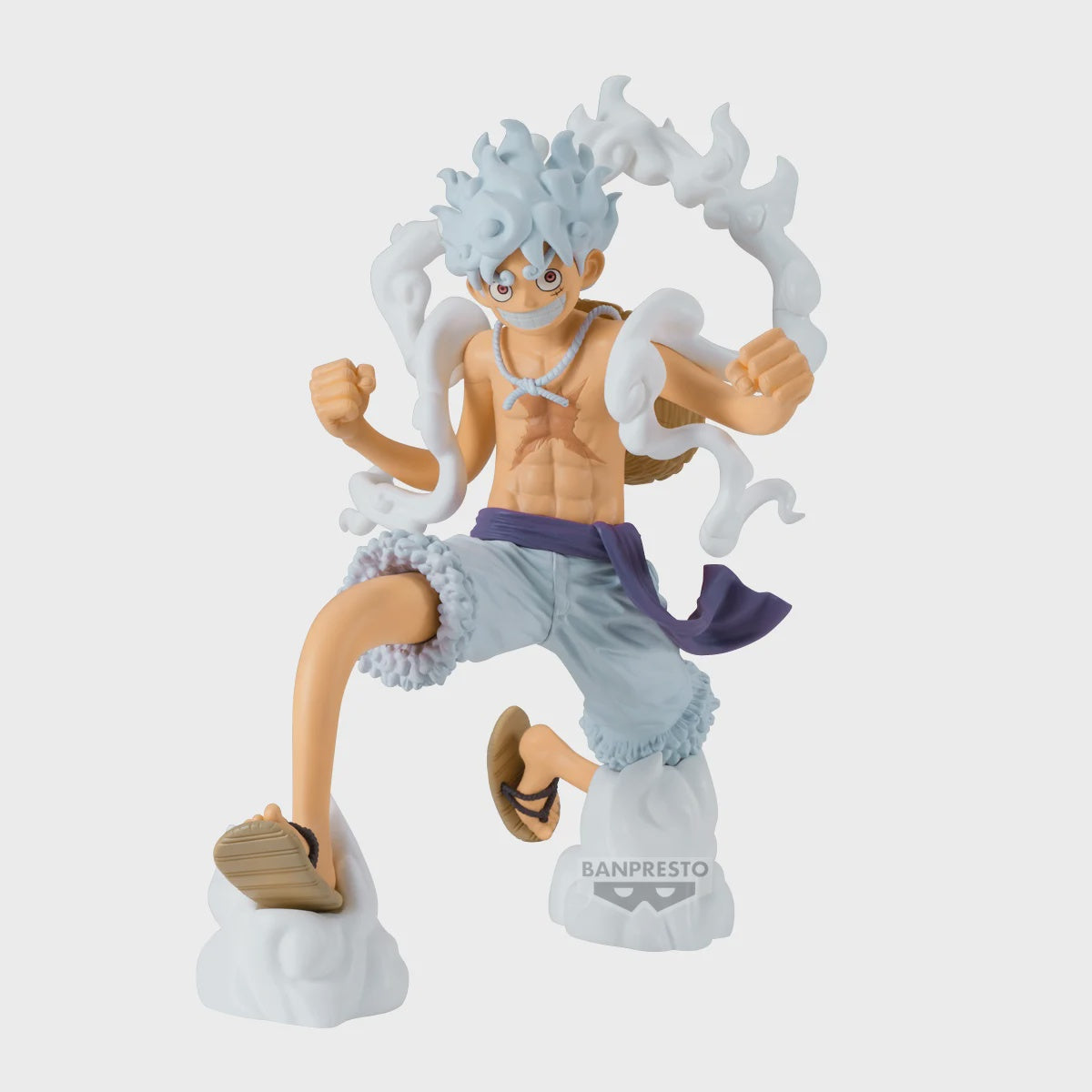 Action figure with white hair and blue outfit on a light gray background
