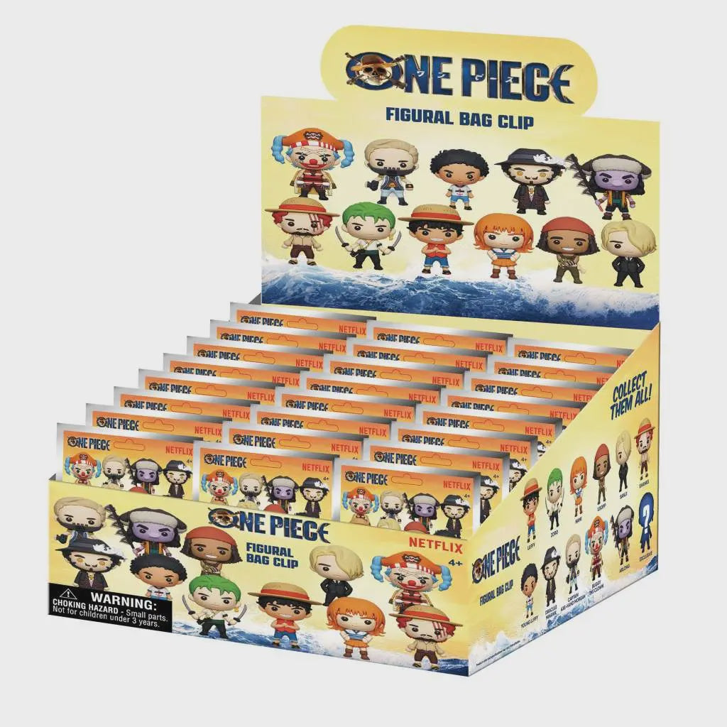 Display box of One Piece figurine bag clips with character illustrations on a white background