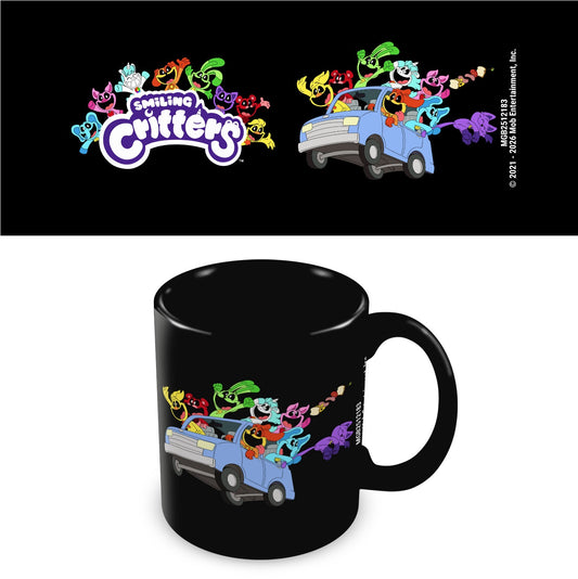 A black ceramic mug with a colorful 'Smiling Critters' cartoon graphic printed around the lower half, shown below a matching black graphic panel featuring the logo and character art. The image includes copyright text for 2021 by 20th Century Entertainment, Inc.