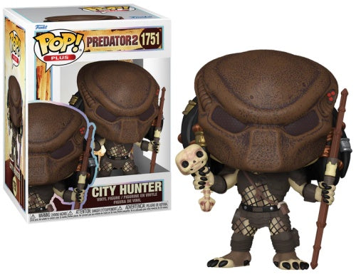 A Funko Pop! figure of a Predator from the movie 'Predator 2', named City Hunter, in its original packaging.
