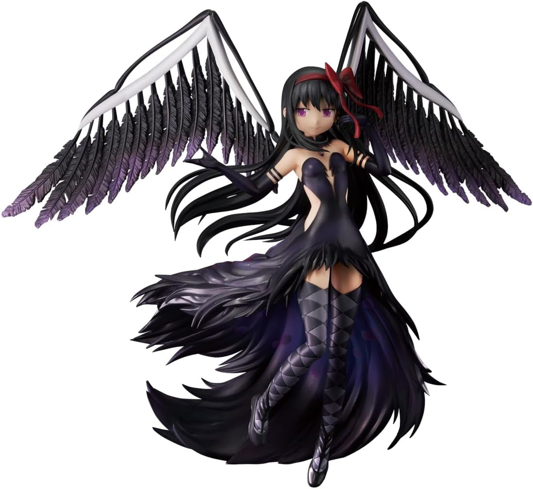 Figurine of a character with black wings and dark outfit on a white background