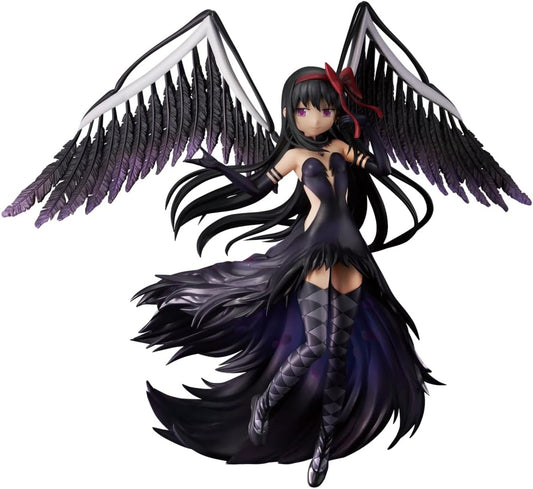 Figurine of a character with black wings and dark outfit on a white background