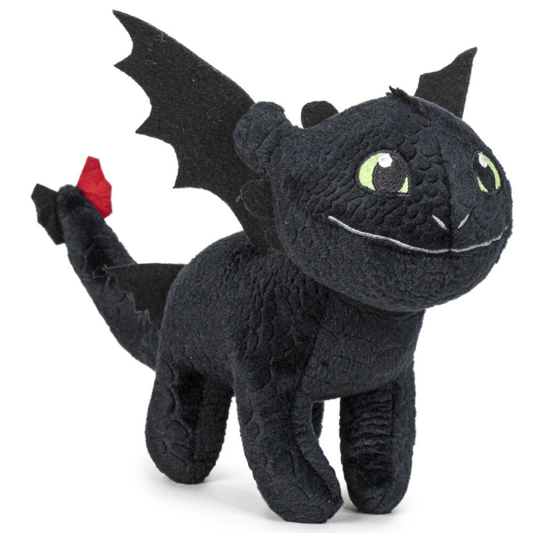 Plush toy dragon with black fur, green eyes, and a red flame on a white background