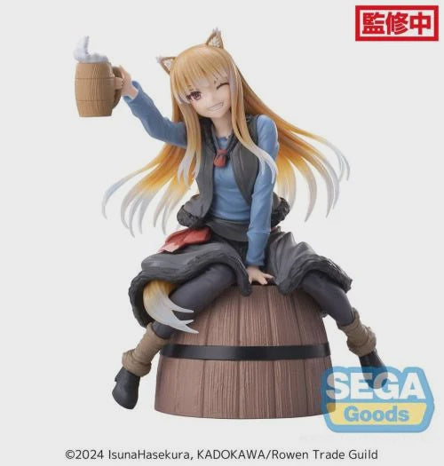 A PVC figure of Holo from Spice and Wolf, sitting on a barrel, holding a cup, with a smiling expression.