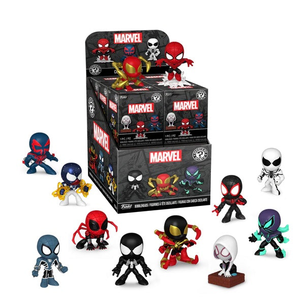 A collection of Spider-Man themed Mystery Minis figurines in various outfits and poses, with packaging visible in the background.